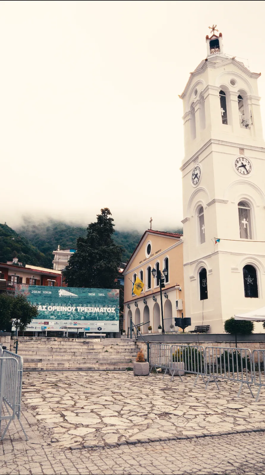 The church and bell tower in the square of Sochos